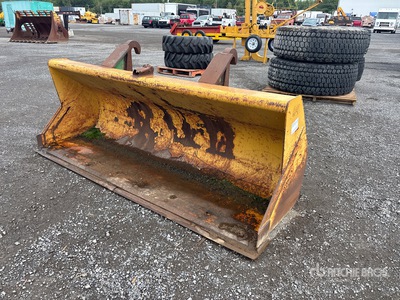 Cat 96 in Backhoe Loader Bucket