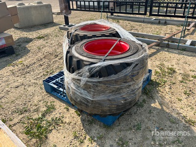 Quantity of (4) Skid Steer Tires & Rim Tires