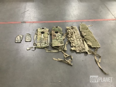 (64) Mag Pouches, (9) Pairs of Trousers (17) Hydration Carriers & Assorted Items