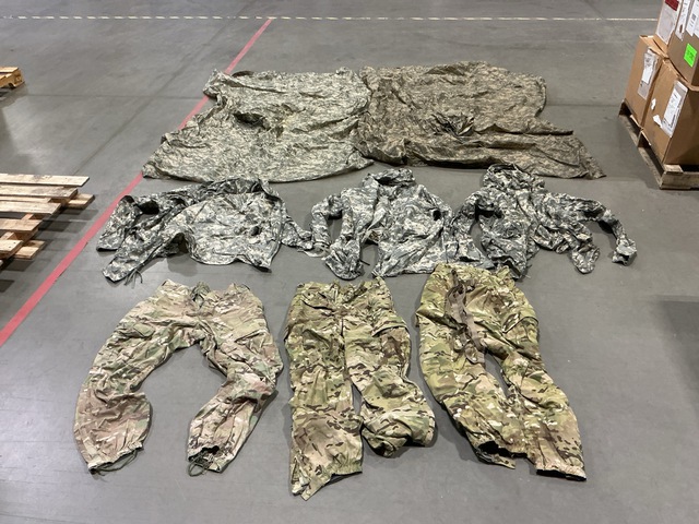 (18) Pairs of Trousers, (60) Wet Weather Ponchos & (6) Parkas (18) Pairs of Trousers, (60) Wet Weather Ponchos & (6) Parkas