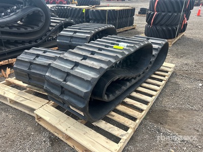 Quantity of (2) 600X125X62 (23 inches) Rubber Tracks (Unused)