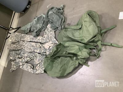 (32) Duffel Bags, (23) Pairs of Coveralls, (58) Mag Pouches & Assorted Items