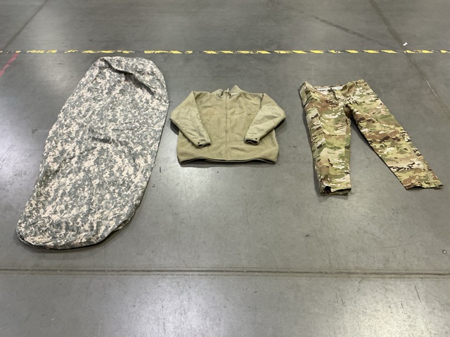 (2) Pairs of Trousers, (2) Cold Weather Shirts, (1) Bivy Cover & Assorted Items
