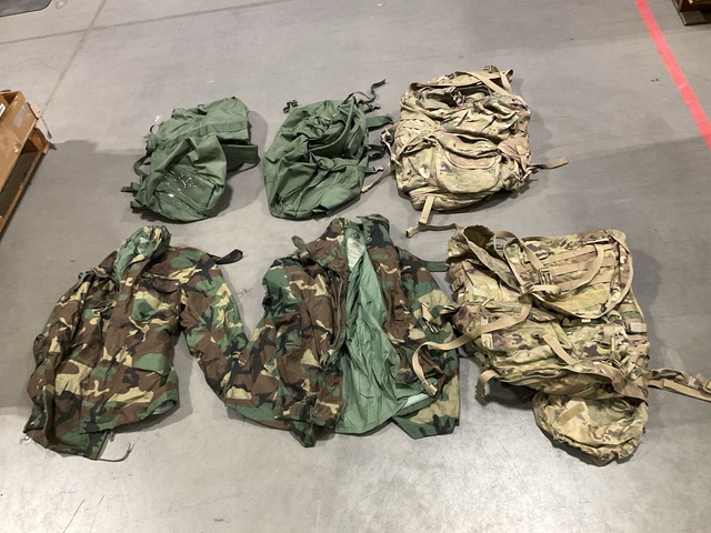 (36) Cold Weather Coats, (11) Field Packs & (4) Duffel Bags (36) Cold Weather Coats, (11) Field Packs & (4) Duffel Bags