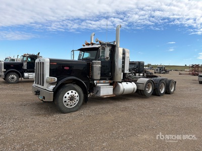 2013 Peterbilt 389 8x4 تراكتور شاحنة (ثلاثي المحور)