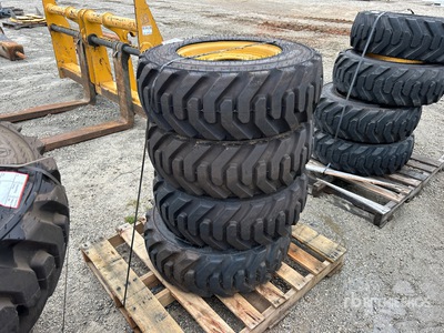 Quantity of (4) 10-16.5 Tires and Wheels for Cat Skid Steer Loader Divers - Accessoires pour chargeuse à différentiel