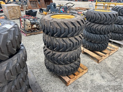 Quantity of (4) 10-16.5 Tires and Wheels for Cat Skid Steer Loader