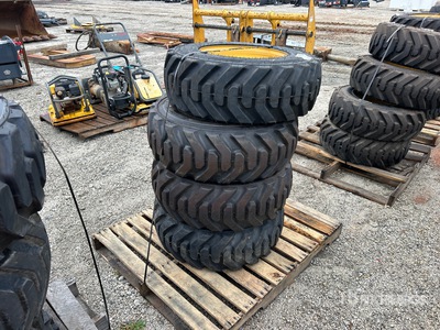 Quantity of (4) 10-16.5 Tires and Wheels for Cat Skid Steer Loader