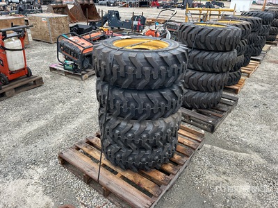 Quantity of (4) 10-16.5 Tires and Wheels for Cat Skid Steer Loader