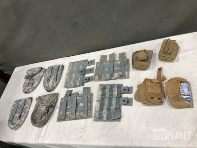 (87) Pouches, (9) Entrenching Tools, (40) Entrenching Carrier & Assorted Items