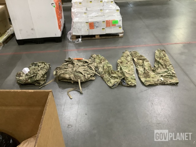 (4) Pairs of Trousers, (1) Field Packs, (3) Pairs of Coveralls & Assorted Items