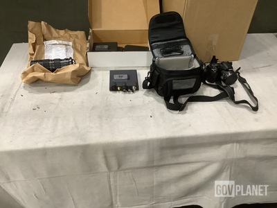 (1) Camera Lens, (4) Digital Cameras, (4) Wave Relays & Assorted Items