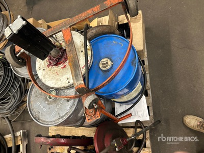 Quantity of (2) New Chassis Grease Barrels w/Pump and Barrel Dolly and 16 gallons of Full Synthetic SAE 50 ورش و مخازن متنوعة