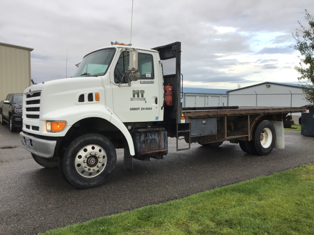 1997 Ford Louisville L8501 S/A Flatbed Truck