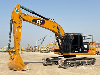 2012 Cat 323DL حفارة بجنزير