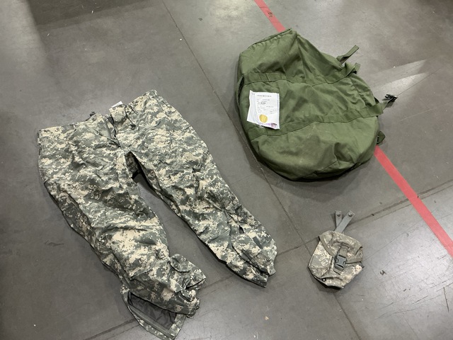 (34) Pairs of Wet Weather Trousers, (30) Duffel Bags & Assorted Items