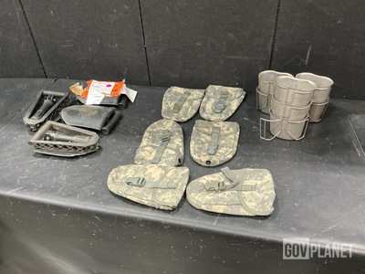 (48) Entrenching Tools, (102) Entrenching Carriers & Assorted Items