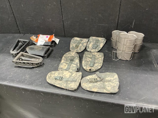 (48) Entrenching Tools, (102) Entrenching Carriers & Assorted Items