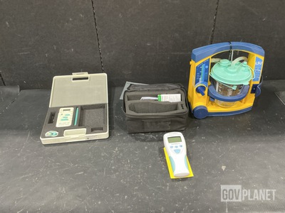 (2) Thermometer Kits, (1) Stimulator, (1) Suction Unit & Assorted Items