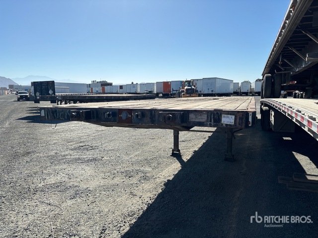 1985 Fruehauf PF-T2-48 48 ft T/A Flatbed Trailer