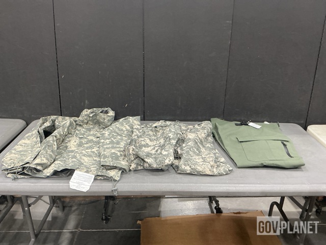 (23) Pairs of Assorted Trousers, (26) Jackets, (2) Parkas, (1) Tarp & (1) Coat