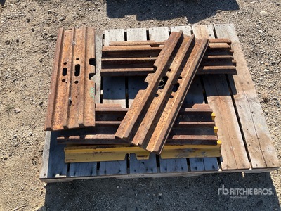 Quantity of (6) Cat 31.5 in Track Pads (Unused)