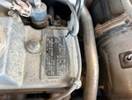 Motore with Emission Label