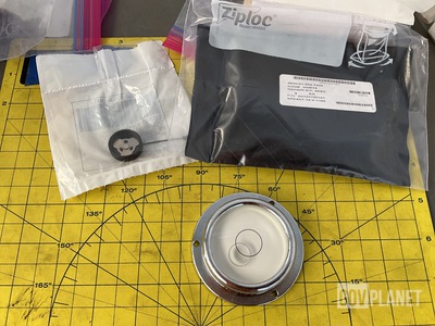 (8) Circular Levels, (1) Storage Battery Lead, (1) Repair Kit & Assorted Items