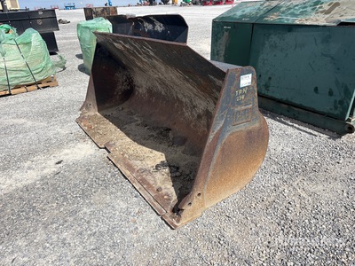 Cat 100 in Wheel Loader Bucket