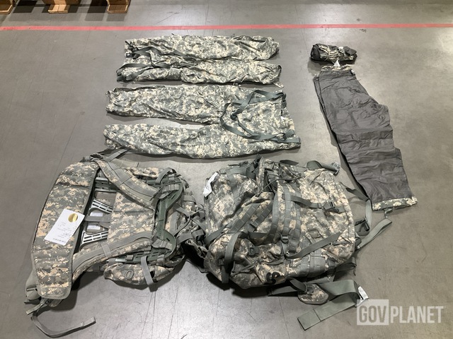 (45) Pairs of Assorted Trousers, (4) Jackets, (2) Field Packs & Assorted Items