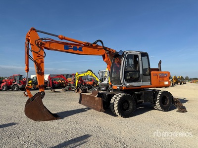 2003 Fiat Kobelco EX135 W Excavadora de Ruedas