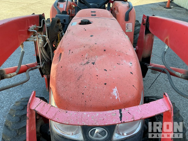 Faded and scuffed tractor hood