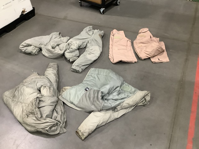 (58) Flyer's Coveralls, (16) Parkas, (16) Trousers & Assorted Items