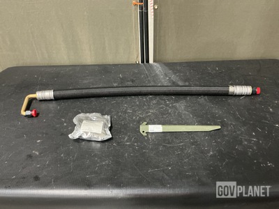 (1) Hose Assembly, (153) Stakes, (3) Brake Valve Port Caps & Assorted Items
