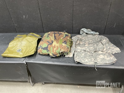 (39) Clothing Bags, (3) Pairs of Coveralls, (3) Parkas & Assorted Items