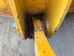 Chassis with Clavijas del cangilón al brazo elevador