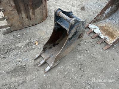 Cat 12 in Digging Excavator Bucket