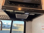 Interior with Stove Hood Exhaust Fan and Vent Cover