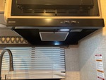 Interior with Stove Hood Exhaust Fan and Vent Cover