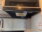 Interior with Stove Hood Exhaust Fan and Vent Cover
