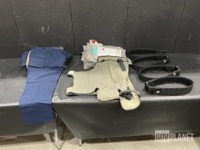 (52) Pairs of Men's Trousers, (6) Cooling Vests & Assorted Items