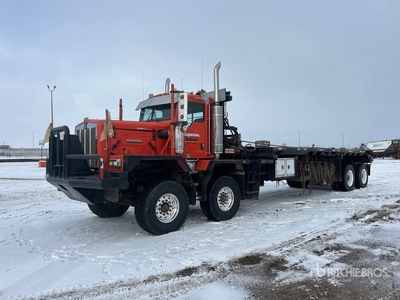 2006 Kenworth C500B 8x4 Twin-Steer 384 in WB شاحنة مسطحة