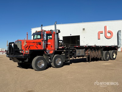 2006 Kenworth C500B 8x4 Twin-Steer Bed Truck