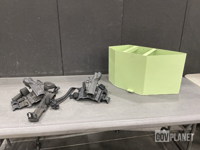 (2) Ammunition Magazine Boxes, (8) Pistol Holsters & Assorted Items