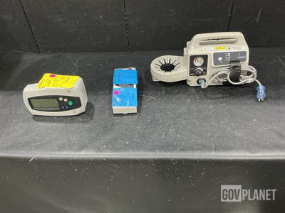 (1) Patient Monitor, (1) Calibration Tester & Assorted Items