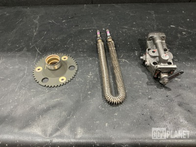 (2) Pipe Flanges, (1) Valve Assembly, (1) Heating Element & Assorted Items