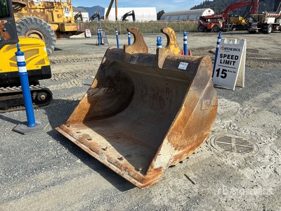 Cat 64 in Cleanup Excavator Bucket