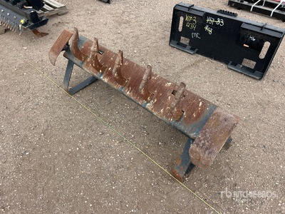 Cat 40 in Skid Steer Ripper