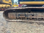 Undercarriage with Left Track Tensioner