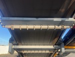 Feeder with Abführbandrollen